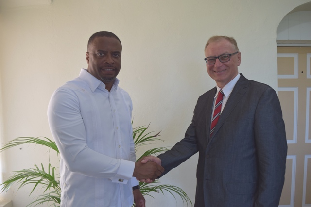 (l-r) Foreign Affairs Minister in St. Kitts and Nevis Hon. Mark Brantley welcomes Poland’s Ambassador to St. Kitts and Nevis His Excellency Piotr Kaszuba at his office in the Nevis Island Administration’s Bath Plain building on July 13, 2016